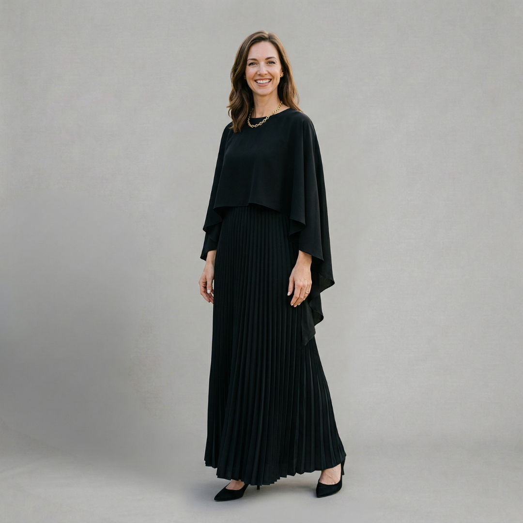Evelyn - Elegant pleated maxi dress with flowing cape overlay