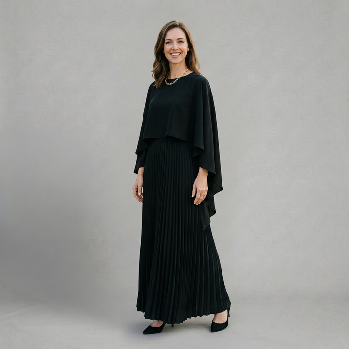 Evelyn - Elegant pleated maxi dress with flowing cape overlay