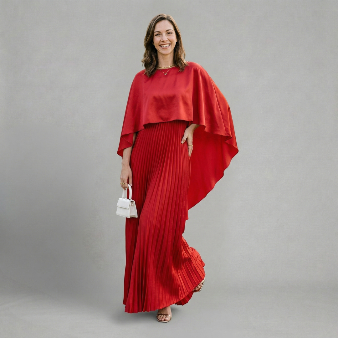 Evelyn - Elegant pleated maxi dress with flowing cape overlay